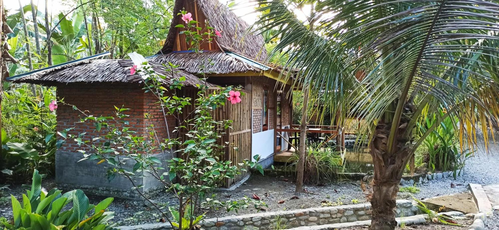 Magpie resto dan homestay Bukit Lawang Bilik gambar